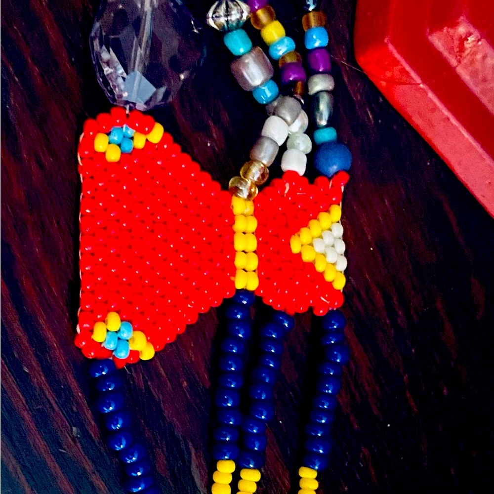 Hand beaded MMIWG red dress piece